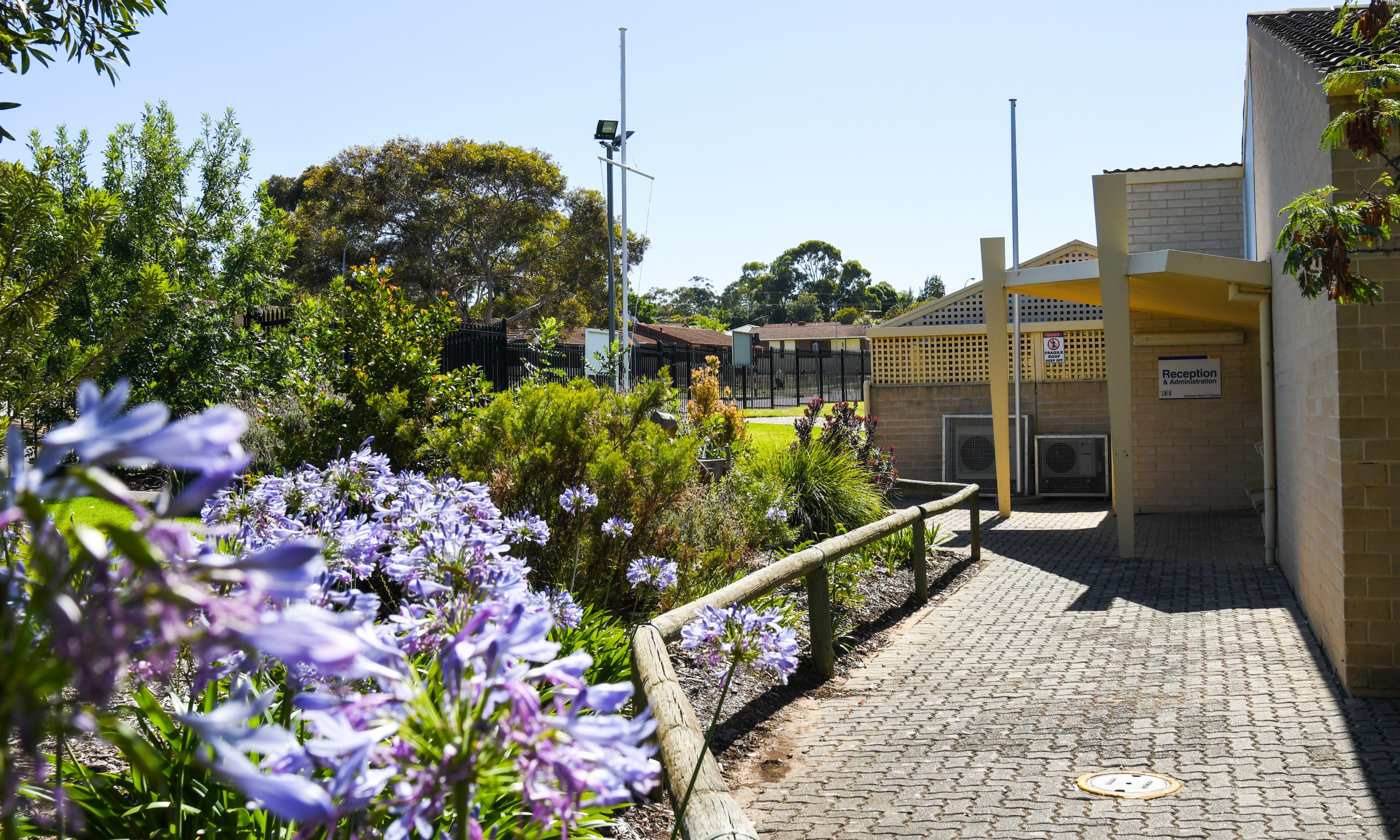 School buildings set amongst pretty gardens